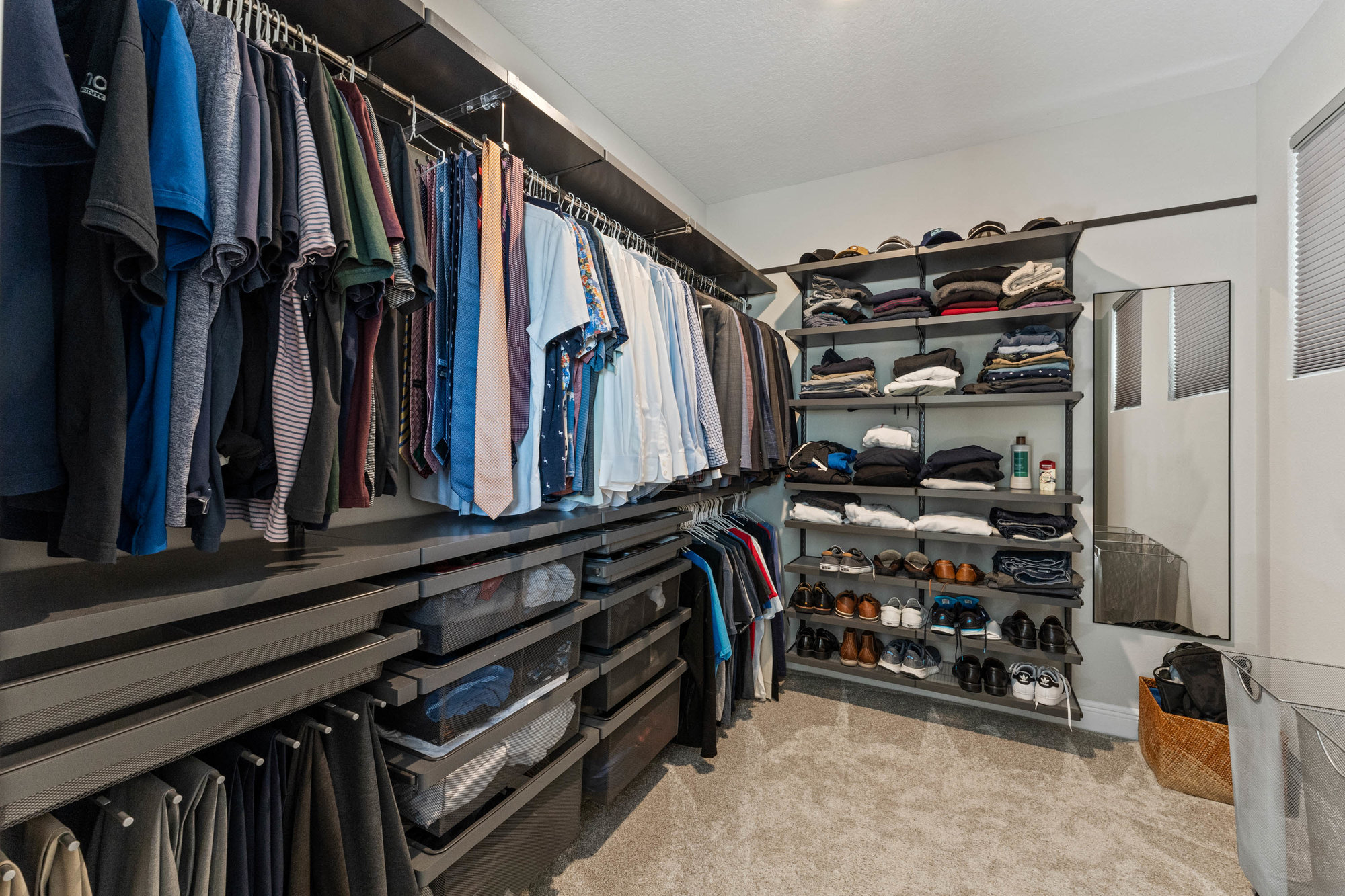 walk in closet with built in racks and shelves